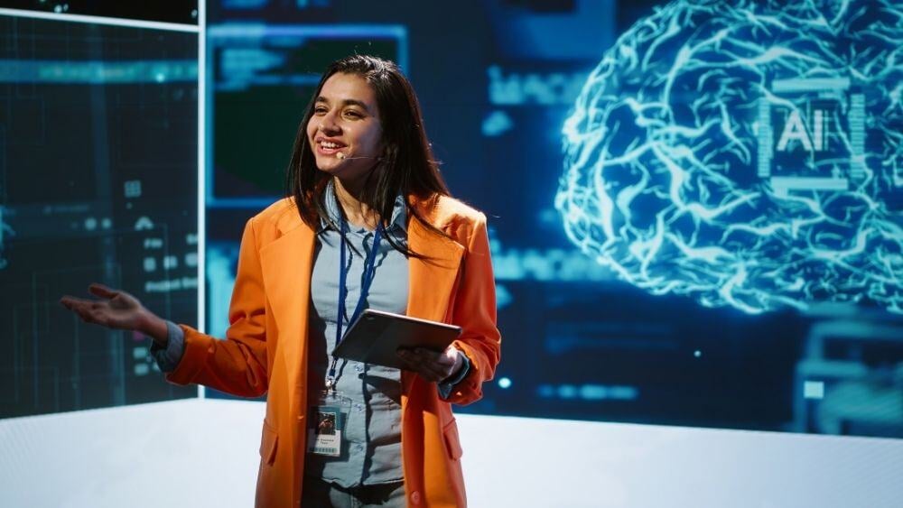 Speaker talks about the strategies behind AI and mobile technology