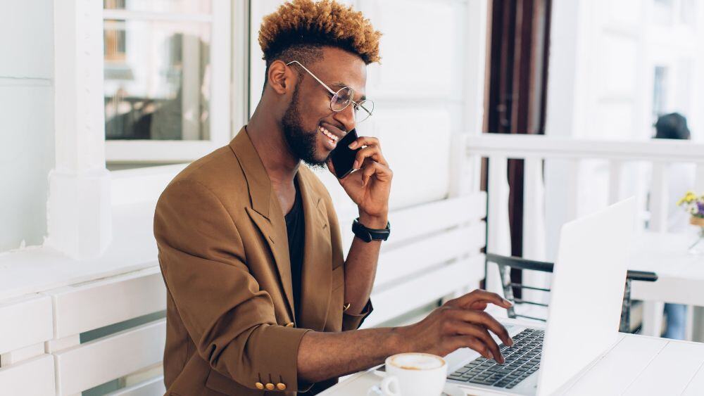 Well-dressed individual analyzes data and customer feedback