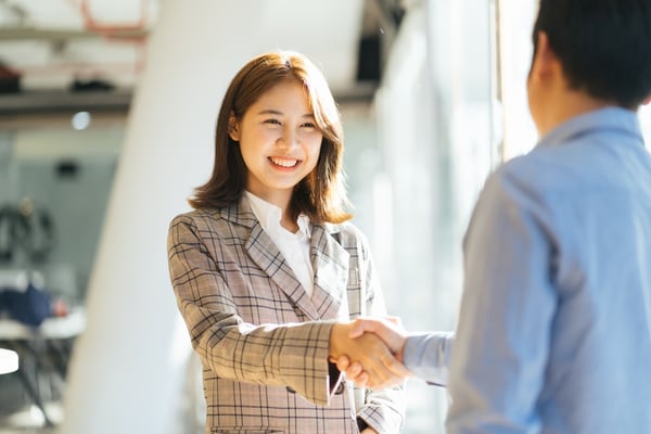 Business person shaking hands