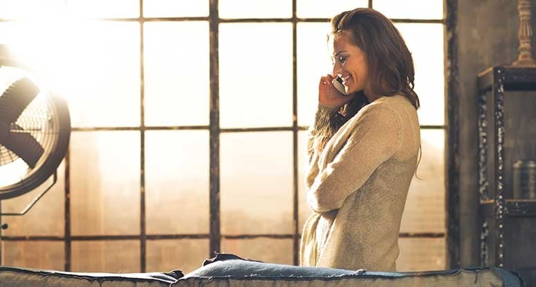woman-on-the-phone-getting-infromation-from-on-demand-contact-center-outsourcing